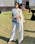 URMI DAGGA IN OUR RELAXED WIDE-LEG TROUSERS
