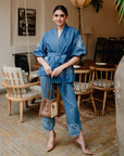 RICHA BEGANI IN OUR WRAP-A-ROSE TOP