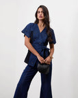 DENIM DAZZLER WRAP TOP