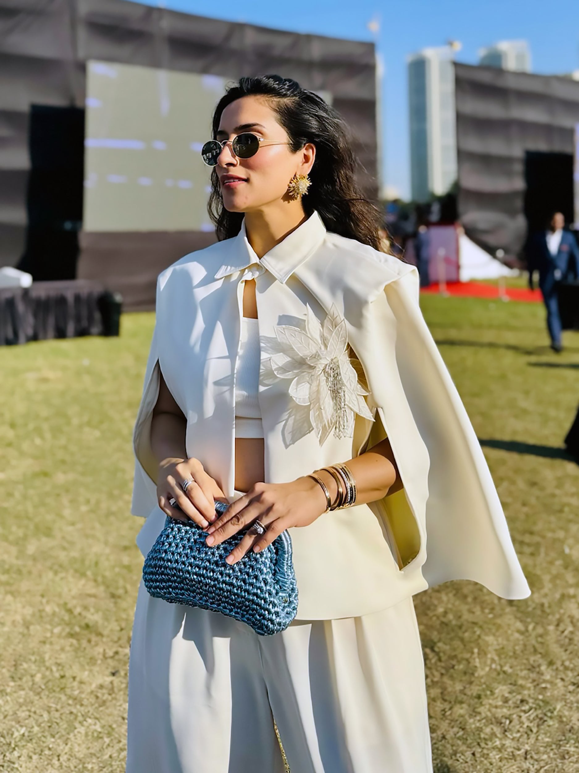 URMI DAGGA IN OUR FLORAL SHEEN CAPE