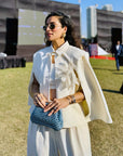 URMI DAGGA IN OUR FLORAL SHEEN CAPE